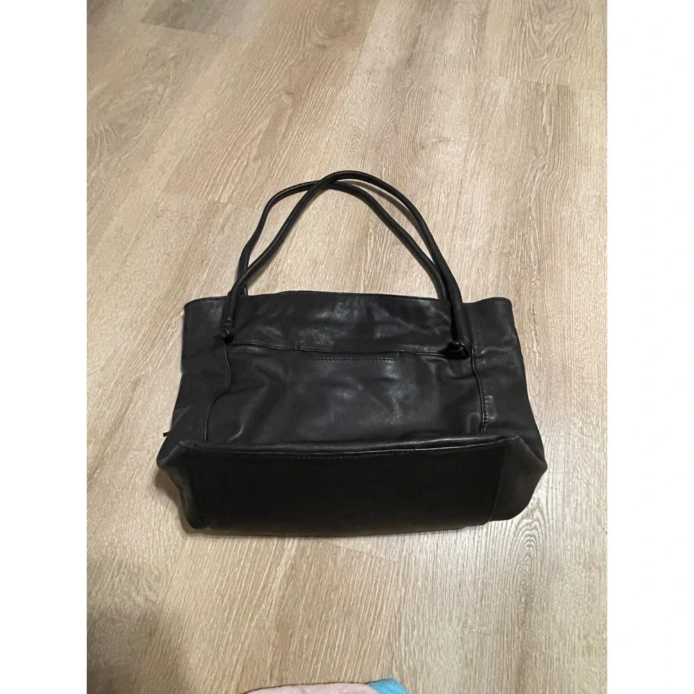 Hobo Black Top Grain Leather Tassel Tote Bag Rolled Straps and Exterior Pocket